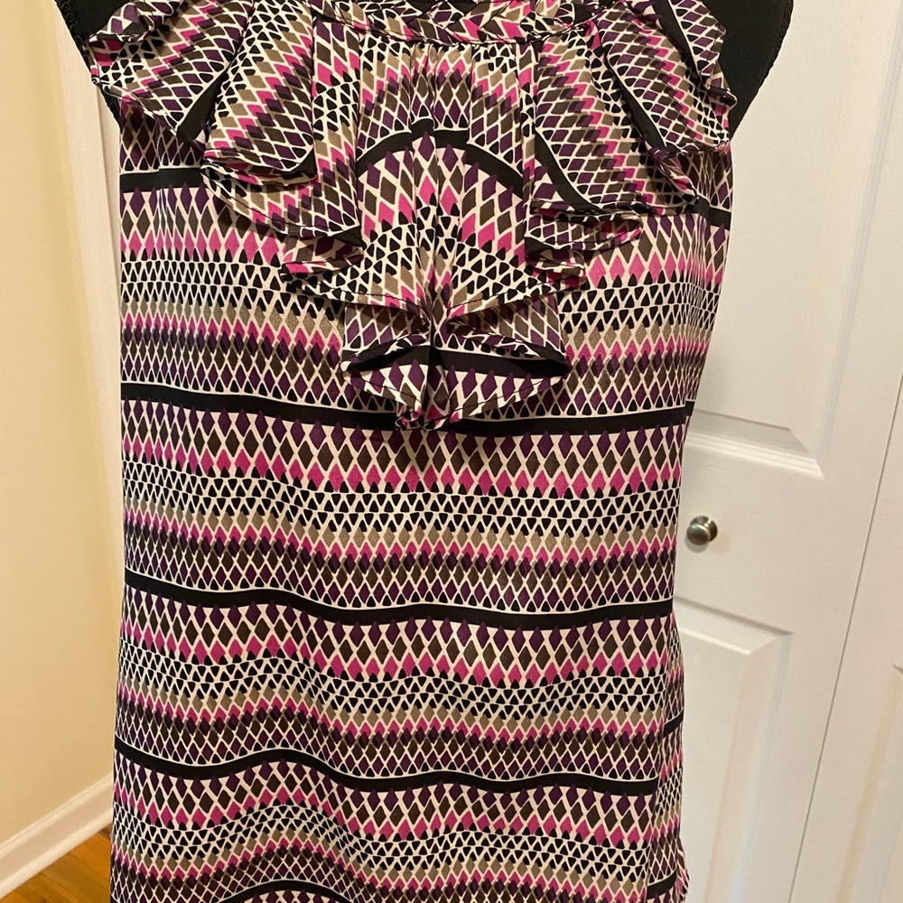 Gently used sleeveless blouse